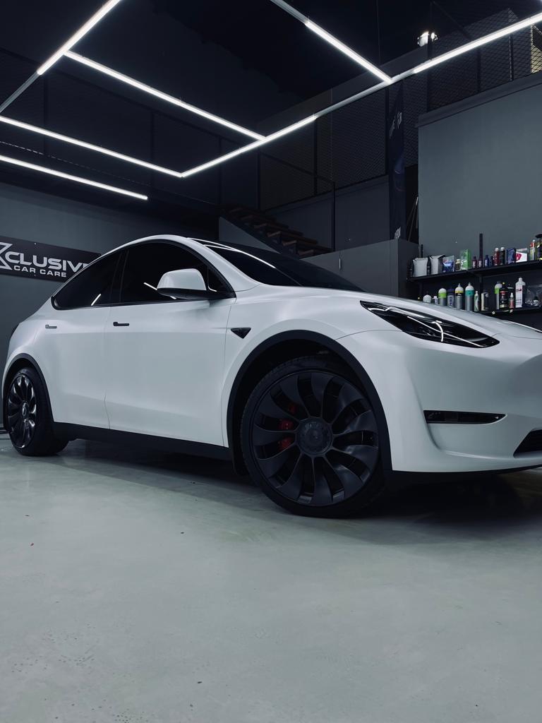 Tesla Gets new  White Matt Finish in Xclusive car care, Ajman Al Jurf - xclusivecc