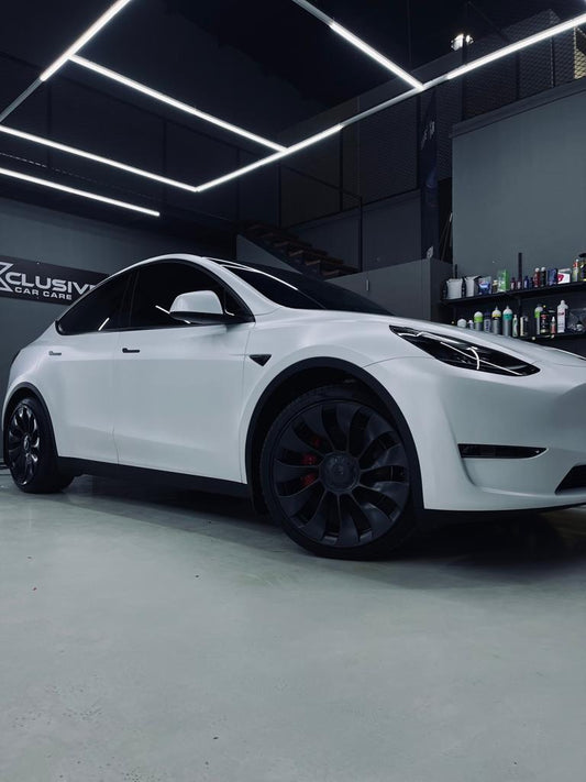 Tesla Gets new  White Matt Finish in Xclusive car care, Ajman Al Jurf - xclusivecc