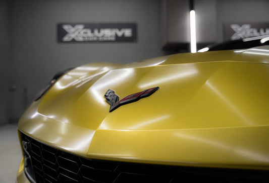 Transforming a Corvette with Xclusive Car Care’s Golden Vinyl Wrap Makeover in Ajman - xclusivecc
